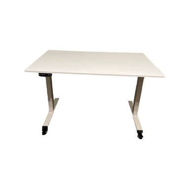 A white Classi Creations Single Tier Adjustable Quilting and Cutting Table with a flat rectangular tabletop and T-shaped legs on wheels. The table features a control panel on the left side for height adjustment, supported by a heavy-duty construction.