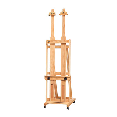 A BEST Ultimate Easel with adjustable height and a sturdy base, equipped with front-locking plastic casters for mobility. The easel has two vertical supports and various clamping mechanisms to hold a canvas in place, ideal for handling large works or adjusting to a compact easel height.