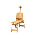 A BEST Caballo mobile beechwood easel with an integrated storage drawer, designed for artists. The easel has an adjustable back and a clamp to hold canvases. It features foldable legs for easy transport and setup. The light wood finish gives it a natural, classic appearance reminiscent of Italian bench/easels.